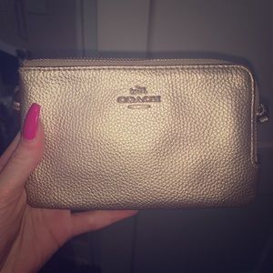 Coach gold wristlet with tags. Real.